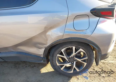 2019 Toyota C-Hr Limited z USA, uszkodzony, nr VIN JTNKHMBX9K1036622